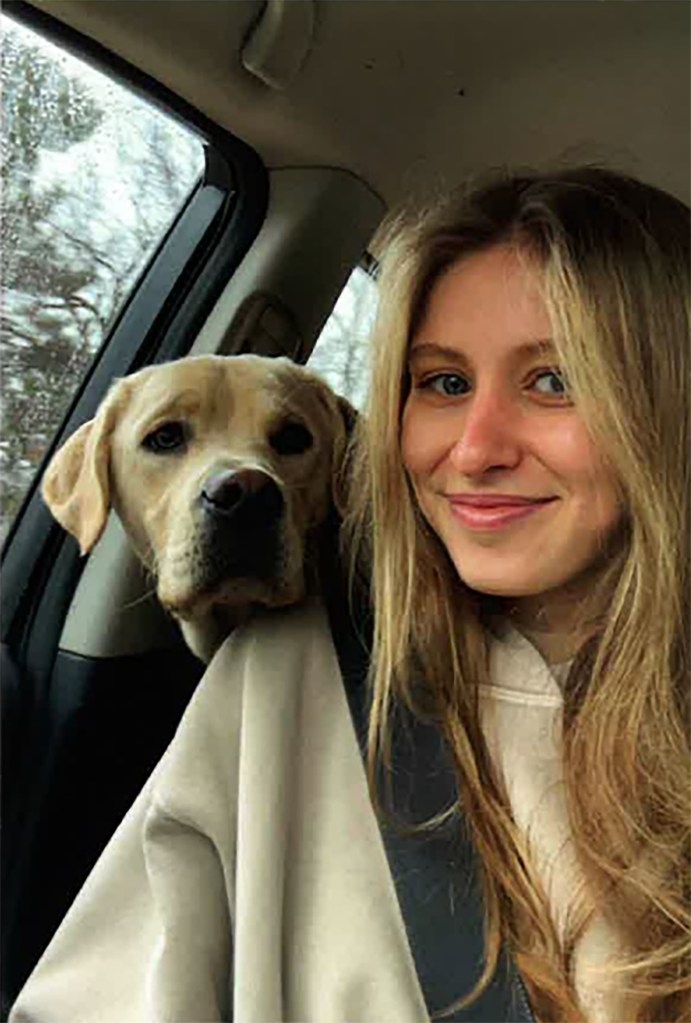 Photo of Eliotte Heinz and her dog.