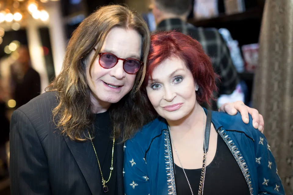 Ozzy and Sharon Osbourne at an art exhibition.