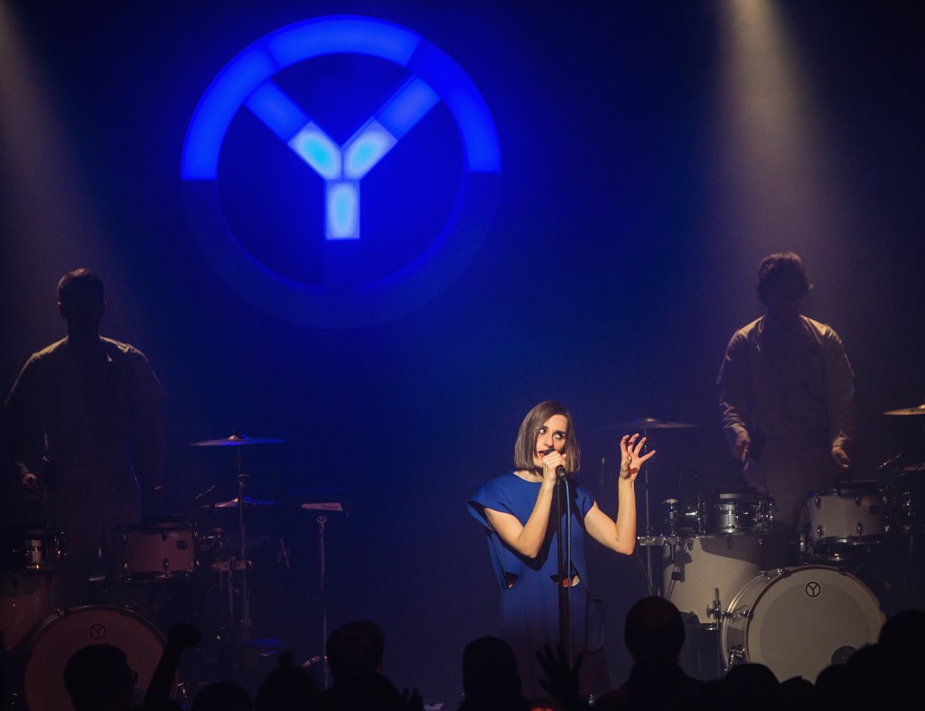 Singer Yelle performing on stage.